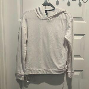 White Reebok women’s hoodie with side tie detail